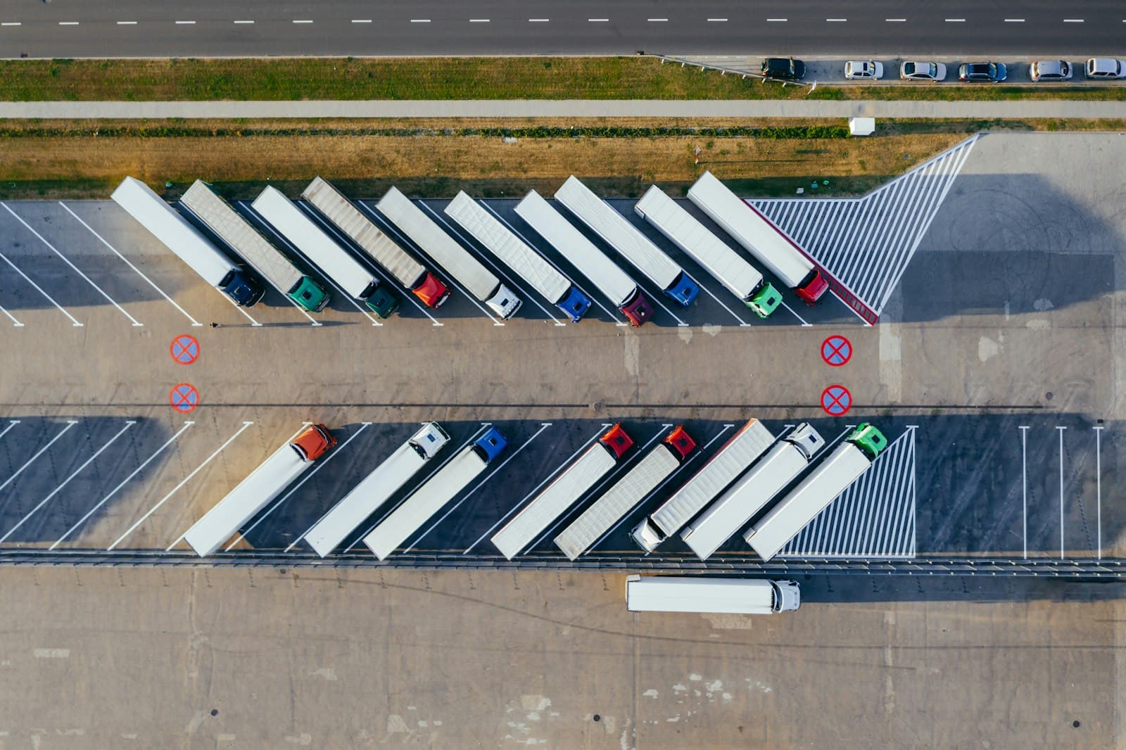 Logistics truck yard where carrier access, gates, and workforce keep freight moving
